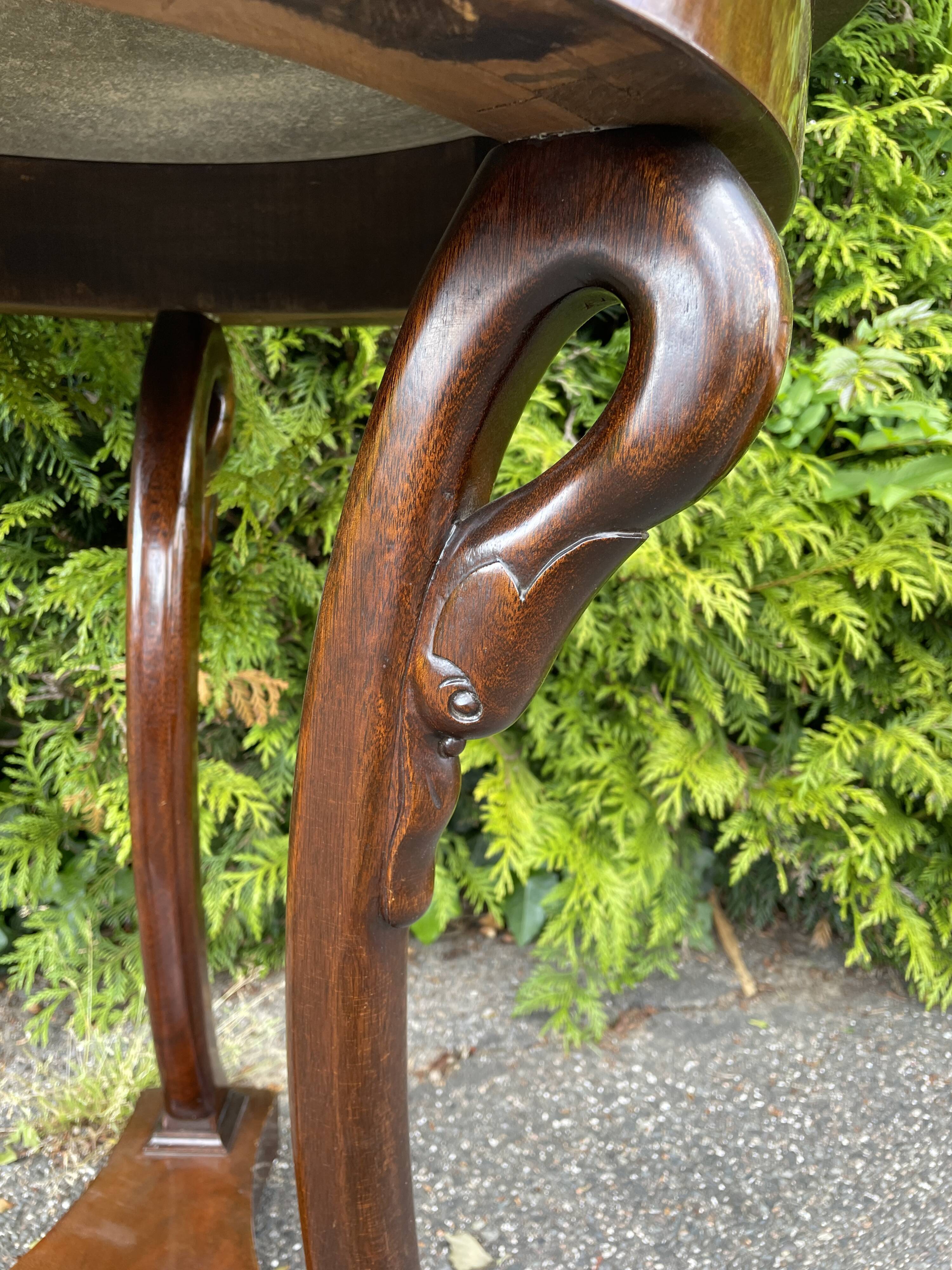 Empire style pedestal table with gooseneck, marble top.