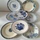 8 assiettes dépareillées en terre de fer bleue, 19ème