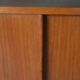 Scandinavian bookcase with storage compartment