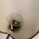 Danish red lacquered wall light with brass details. Estimated 1980s