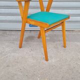 Light wood bridge armchair