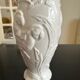 Vase with parrots