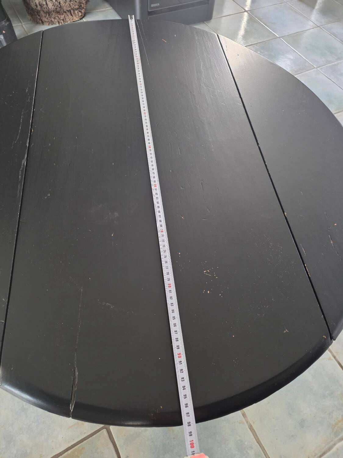 Oval gateleg table from the late 19th century, repainted in black.