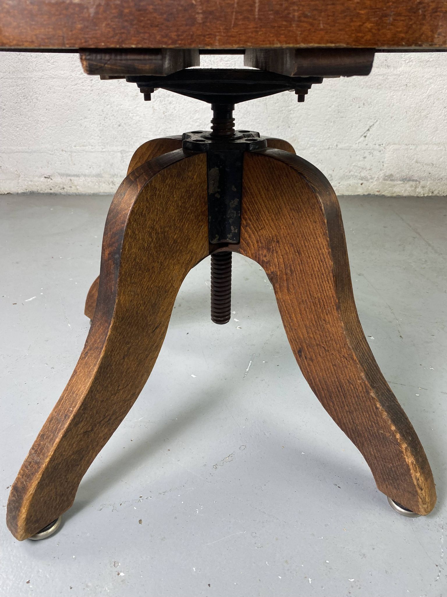 Baumann rotating wooden armchair