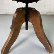 Baumann rotating wooden armchair