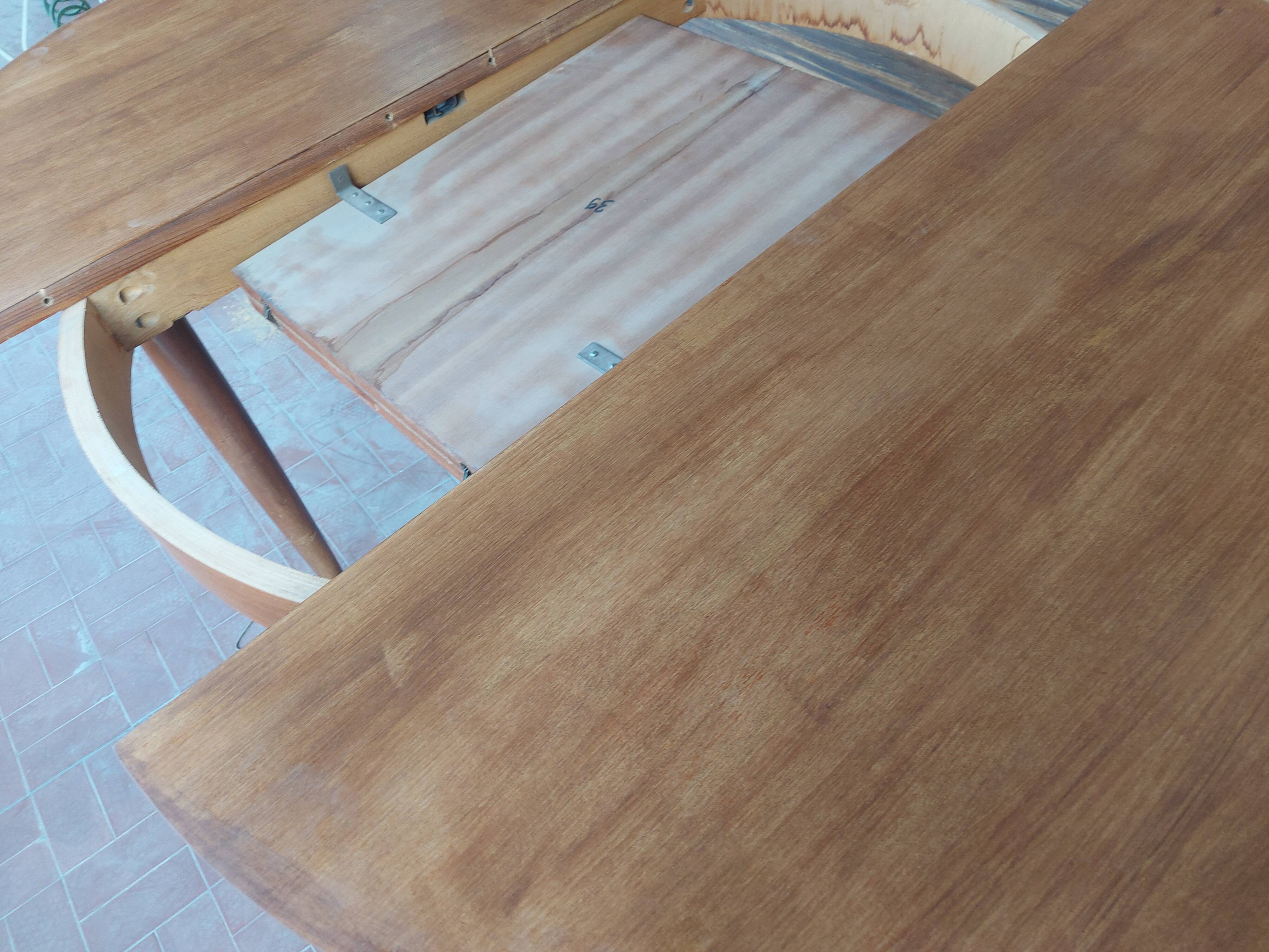 Scandinavian design teak table with extension cord