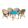 Rattan living room consisting of a coffee table and 4 rattan shell armchairs