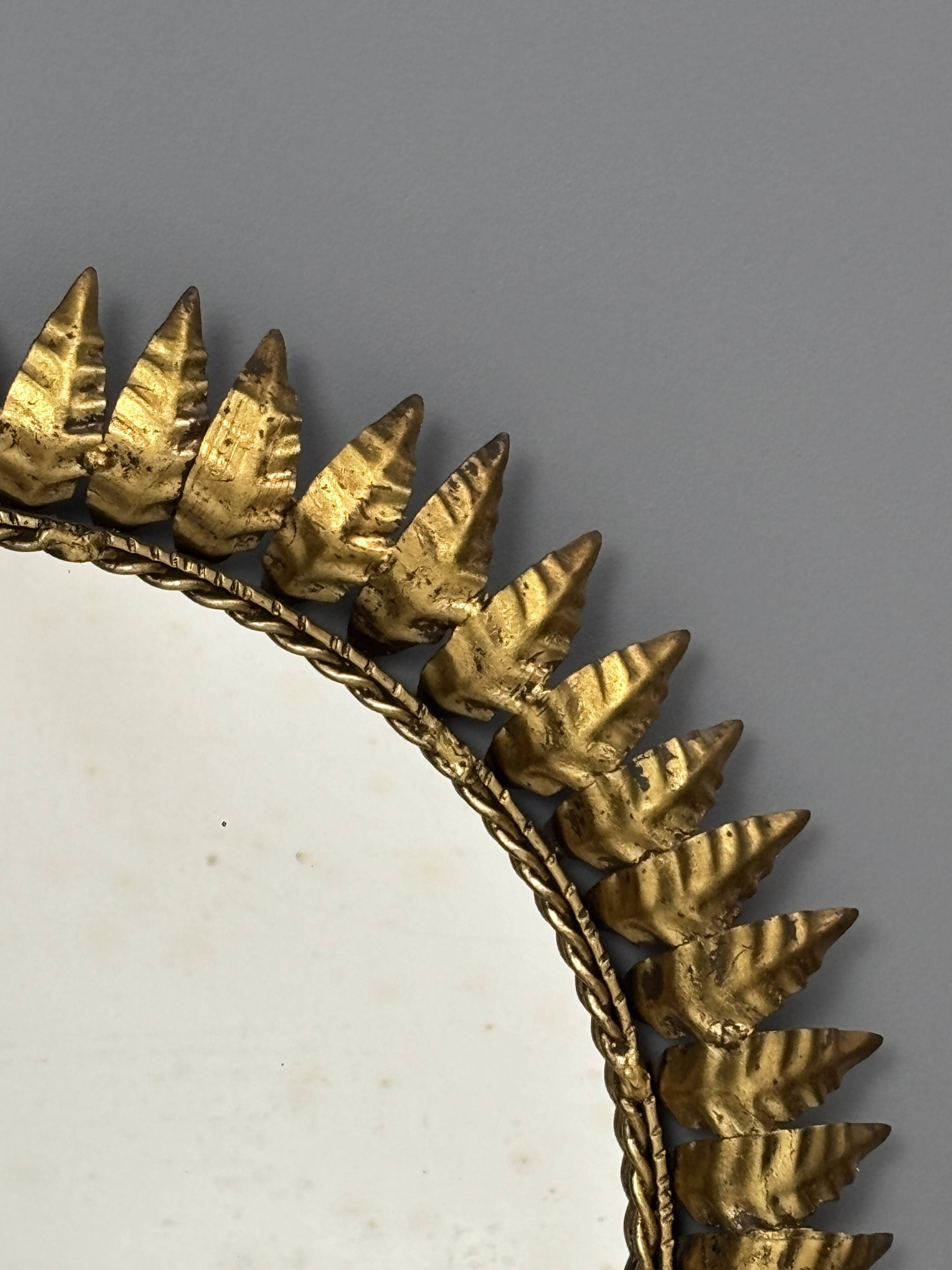Midcentury bohemian Hollywood Regency Spanish gilt metal sun mirror, 1960s