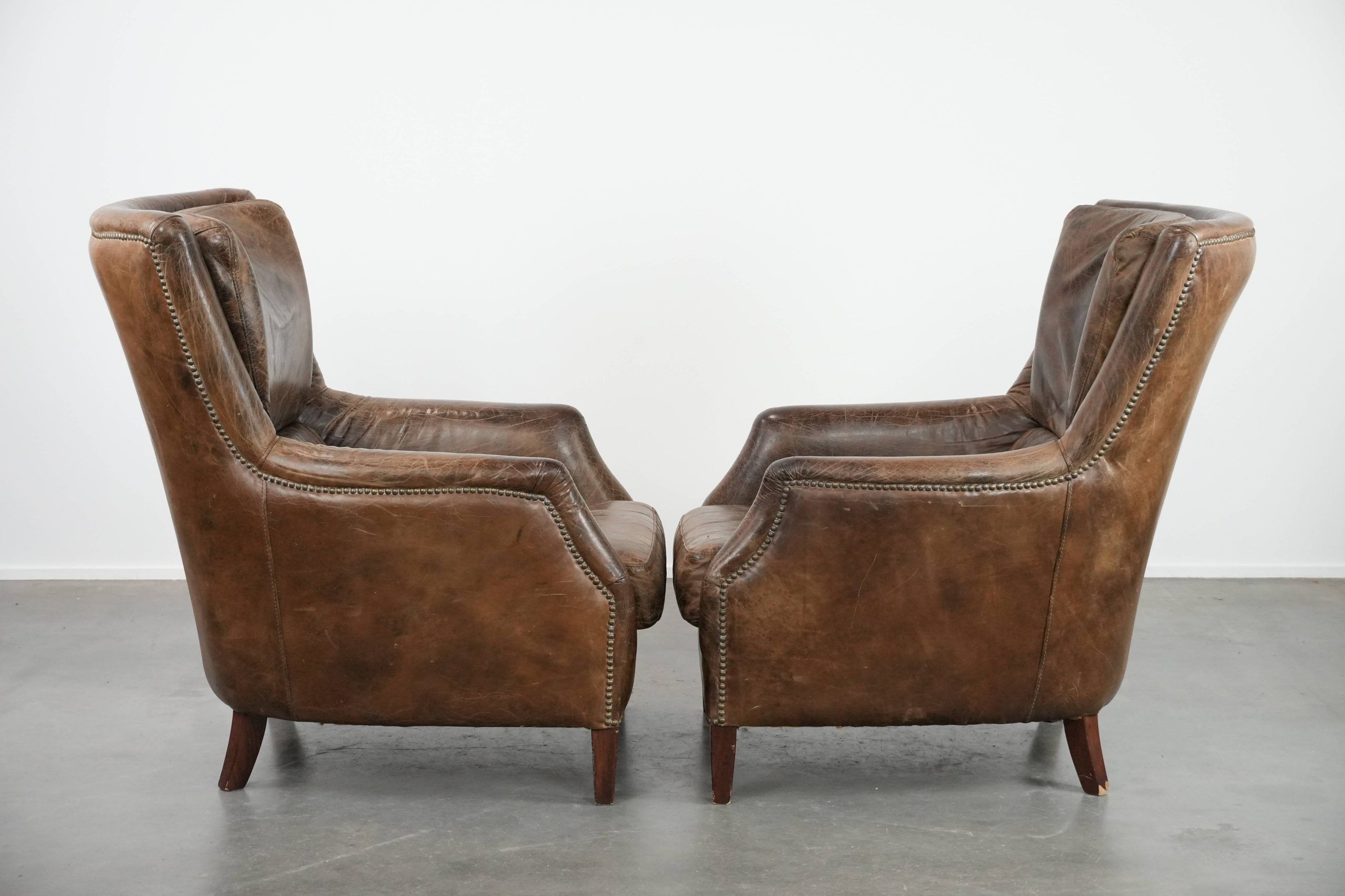 Very comfortable set of two vintage cowhide leather armchairs