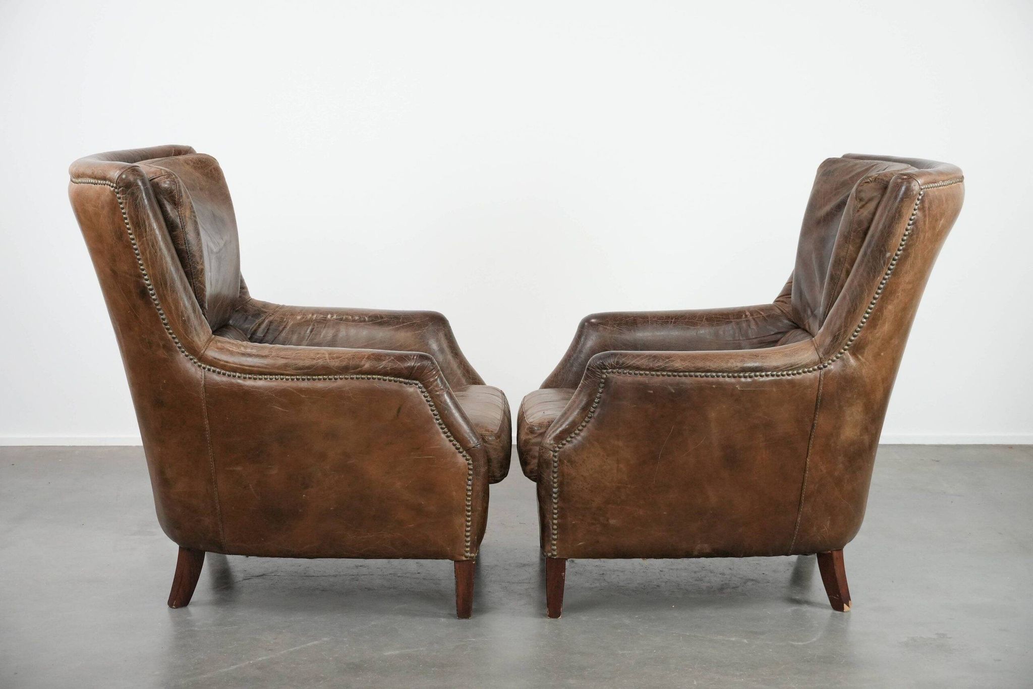 Very comfortable set of two vintage cowhide leather armchairs