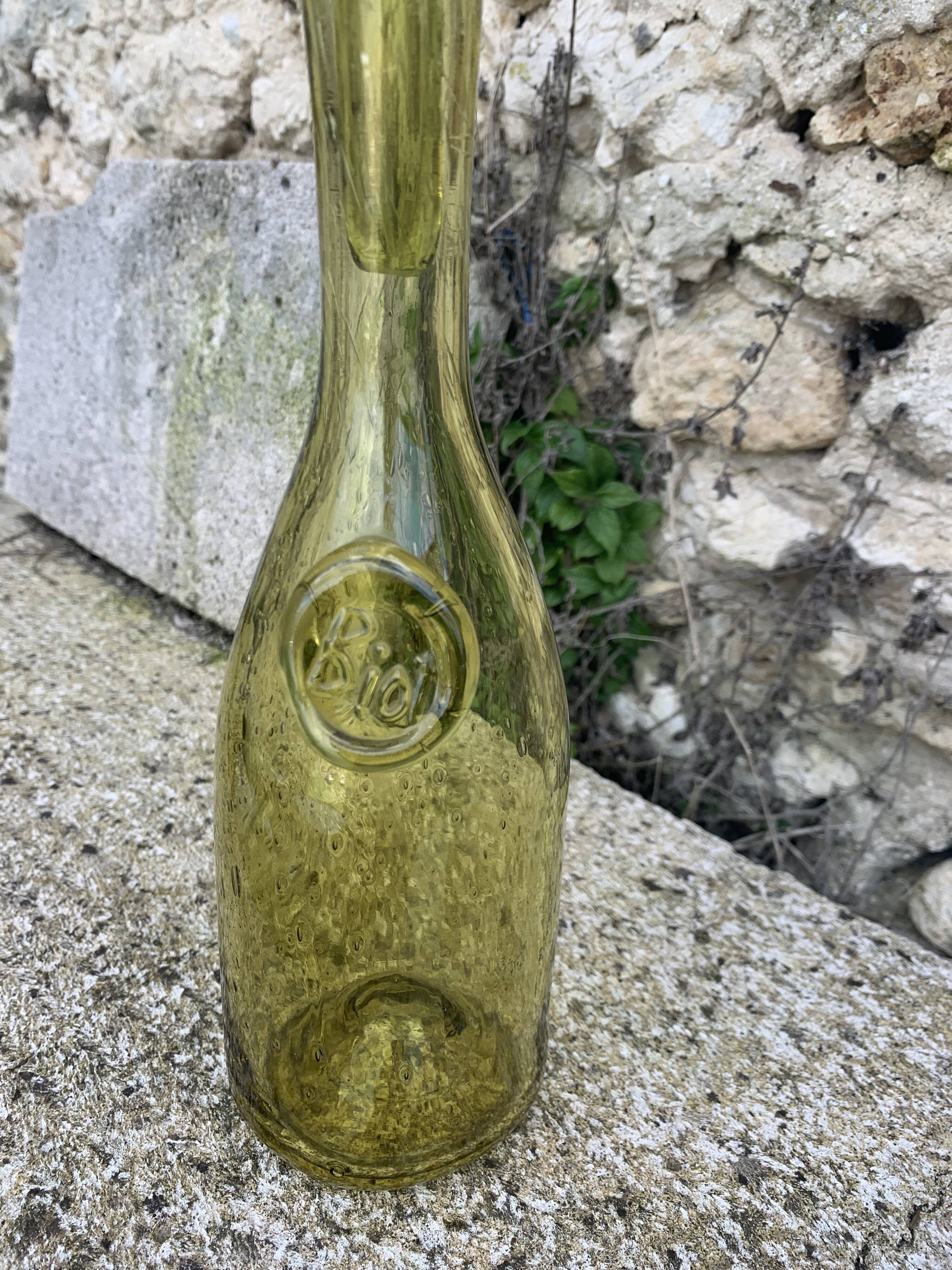 Glassblown glass decanter from the Biot collector glassworks