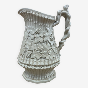 Antique embossed wine pitcher