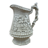 Antique embossed wine pitcher