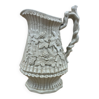 Antique embossed wine pitcher