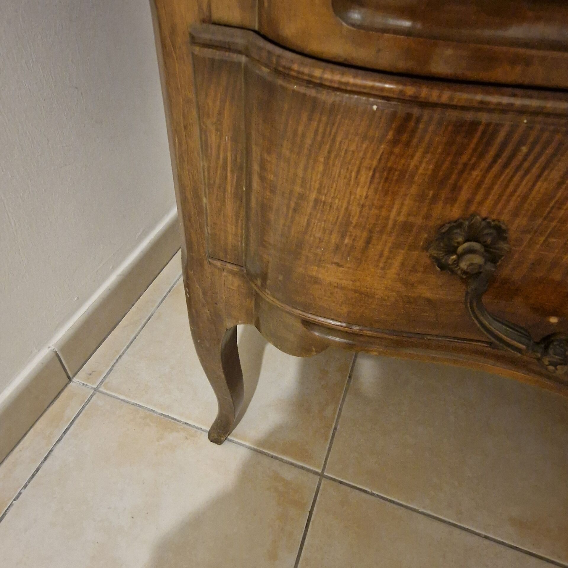 curved commode in Louis XV style made of solid wood