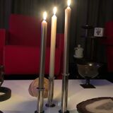 Three silver metal candle holders