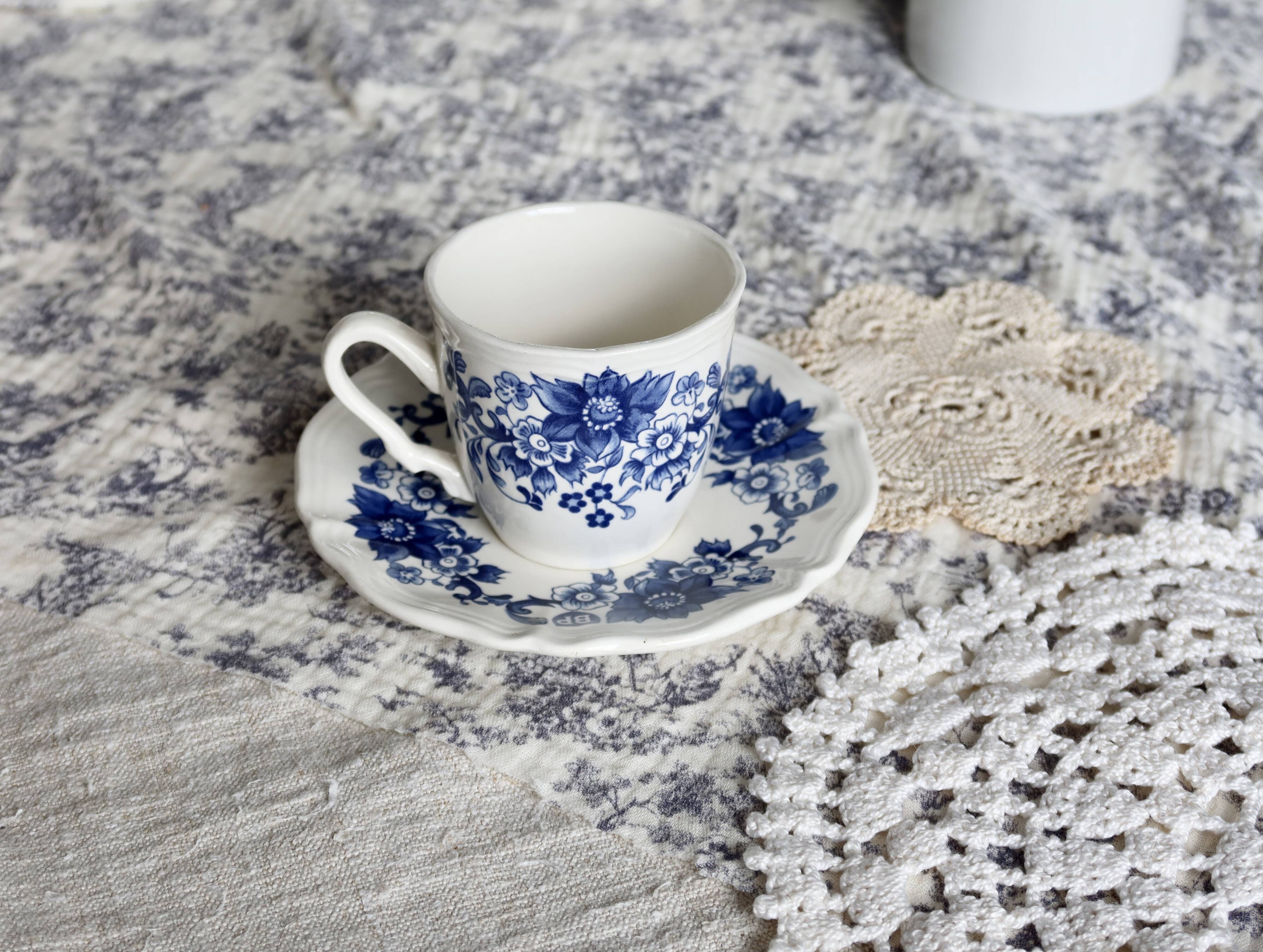 Vintage Sarreguemines cup & saucer – White earthenware with blue floral decoration