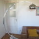 Lampadaire arc Guzzini alu chrome travertin