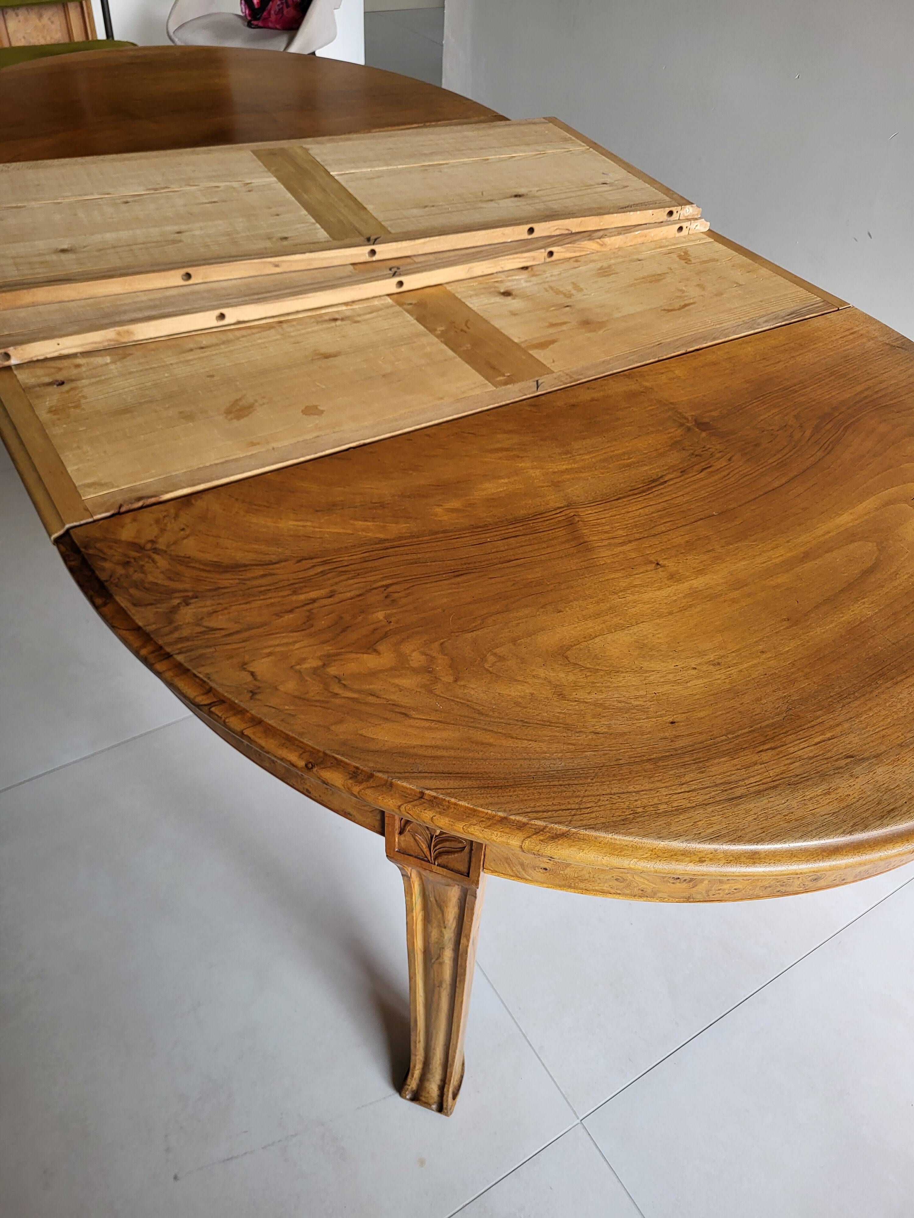 Table and 10 Art Nouveau style chairs.