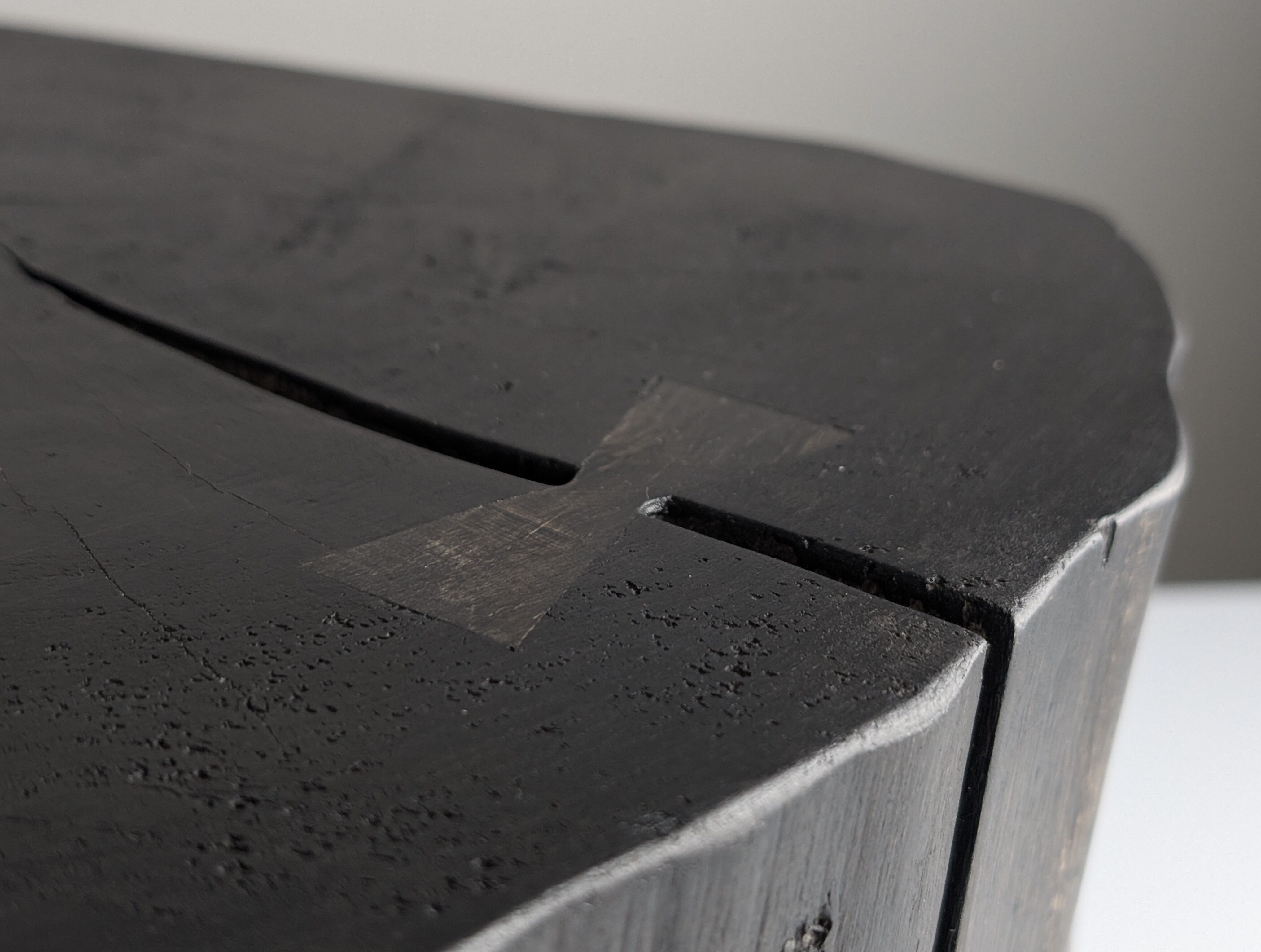 Wabi-Sabi black ebonised wood stool with butterfly joints