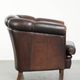 Dark sheepskin club armchair with unique design in English style
