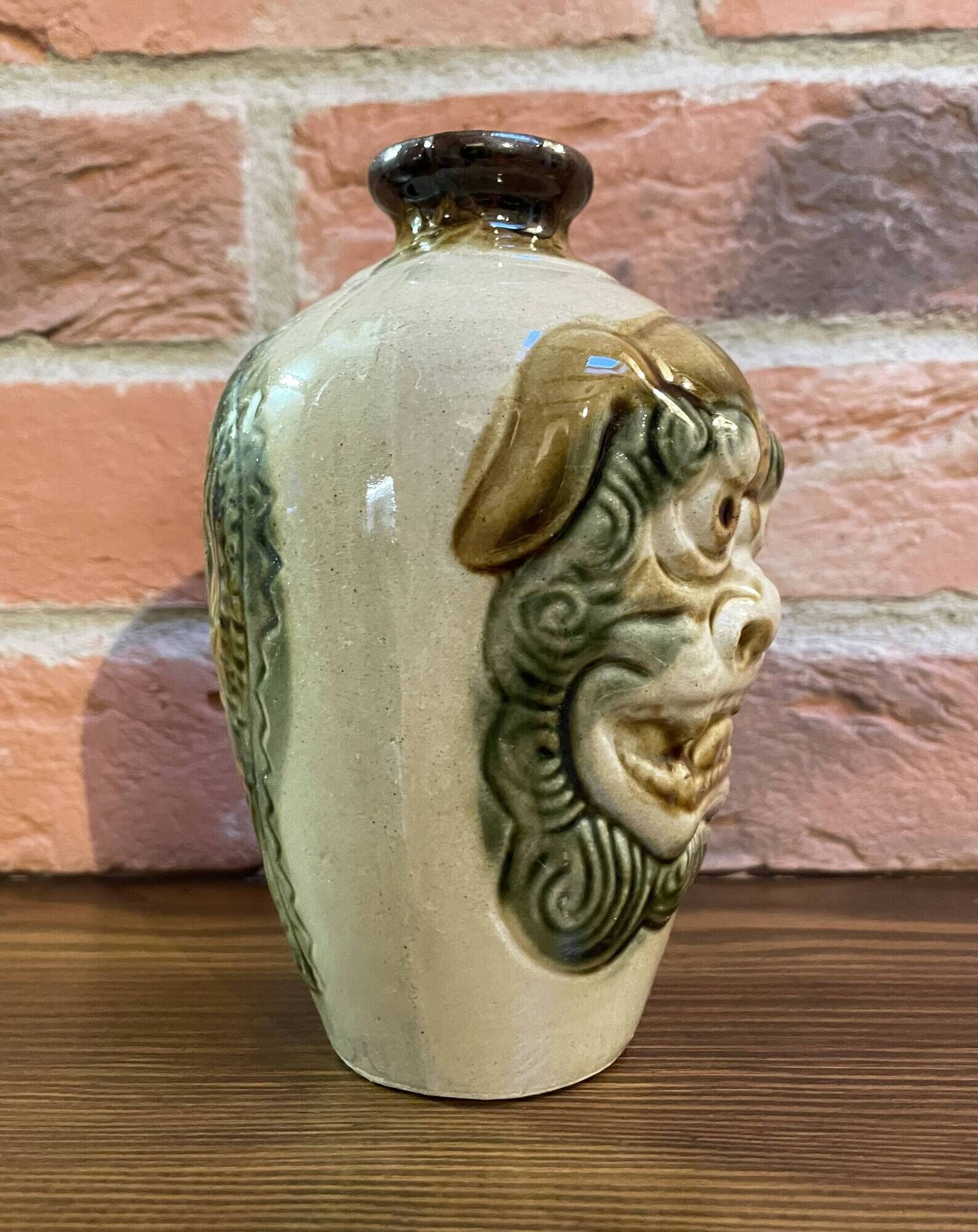 Japanese Awamori Bottle by the Helios Distillery (Okinawa) with Raised Lion and Dragon Design