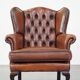 Brown leather wingback Chesterfield armchair