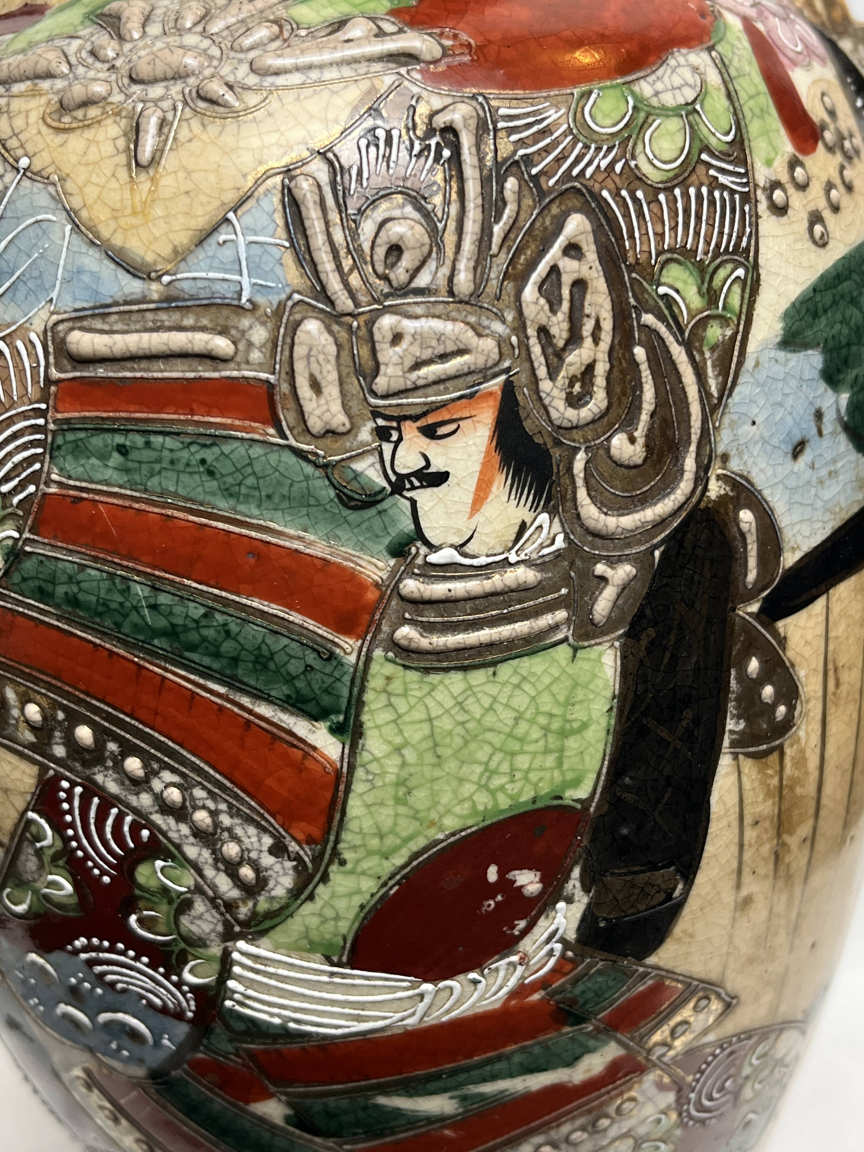 Japan, Satsuma vase with richly decorated handles, signed, early 20th century