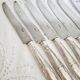 Set of 11 vintage knives, steel blades and silver handles