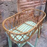 Rattan bassinet with hood arches