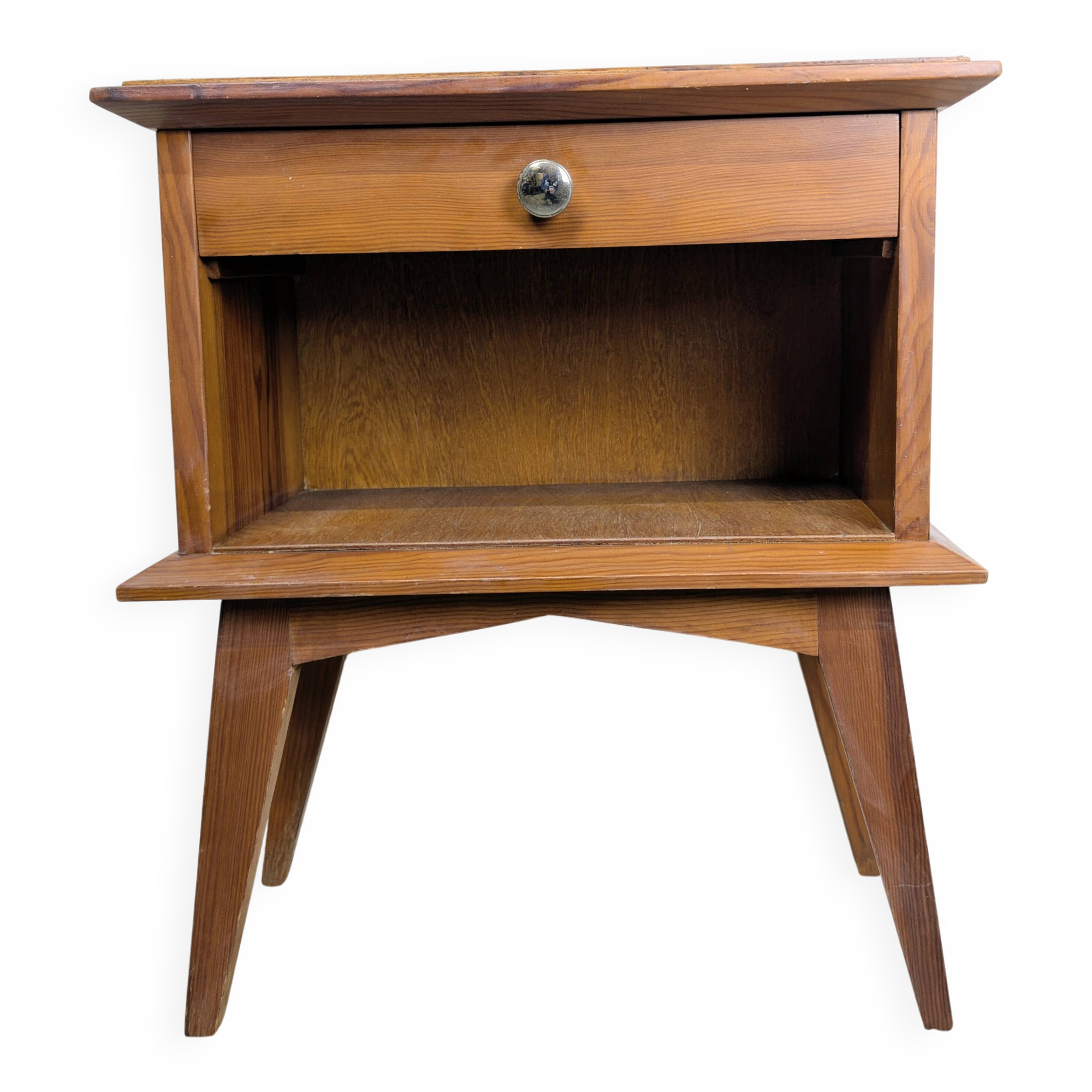 Vintage bedside table with tapered legs.