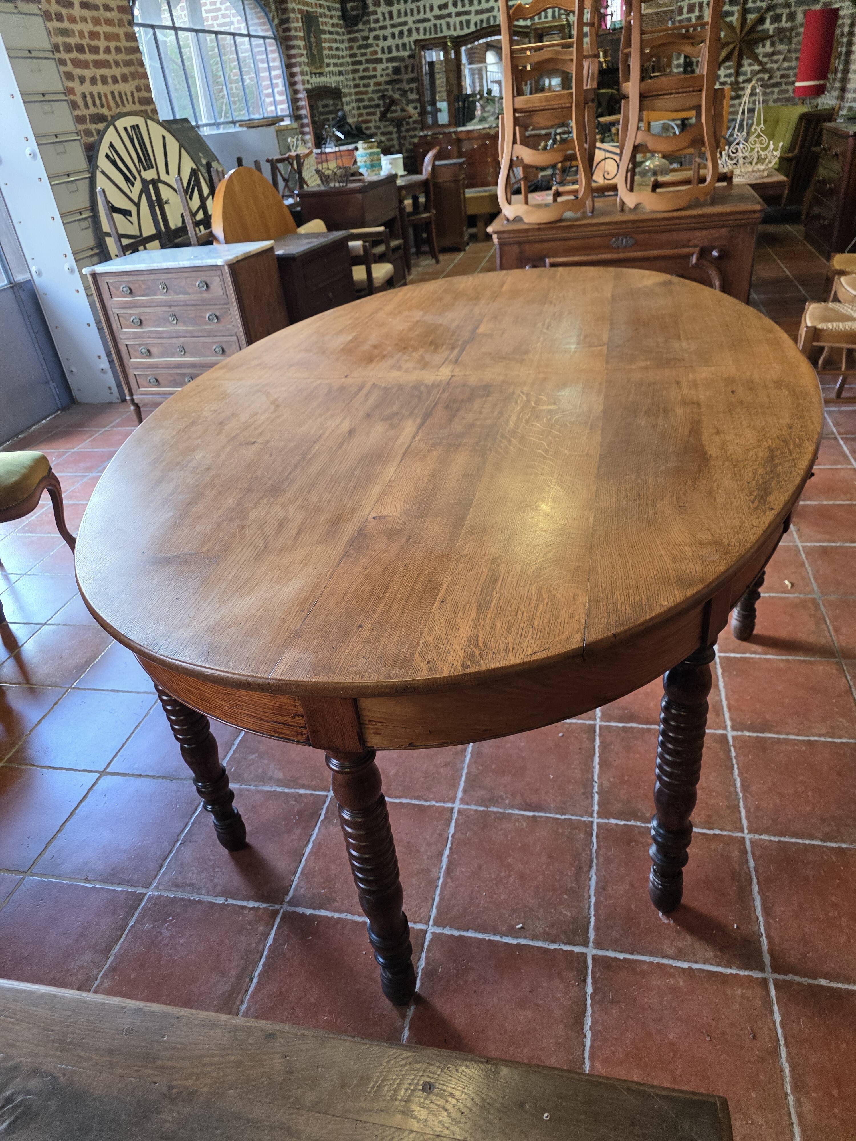 Large oval farmhouse table in solid oak, 19th century, 243 × 153cm