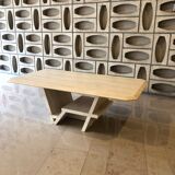 Rectangle travertine table with geometric foot