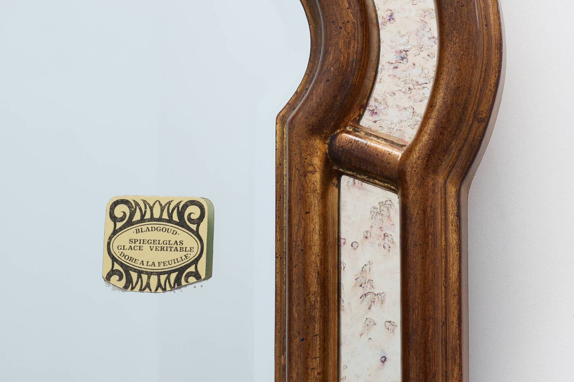 Arched gold-leaf mirror with marbled glass border by Deknudt, Belgium, 20th
