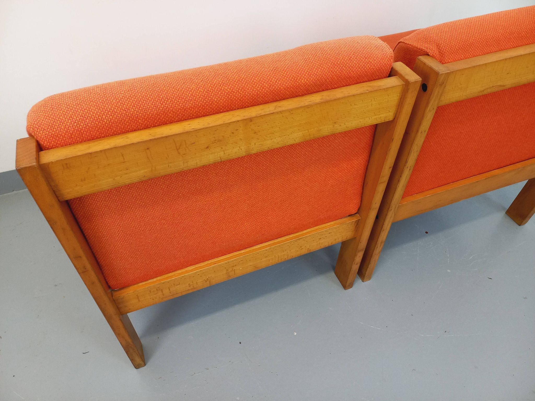 Set of 2 vintage Baumann armchairs in orange fabric and wood from the 80s