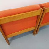 Set of 2 vintage Baumann armchairs in orange fabric and wood from the 80s