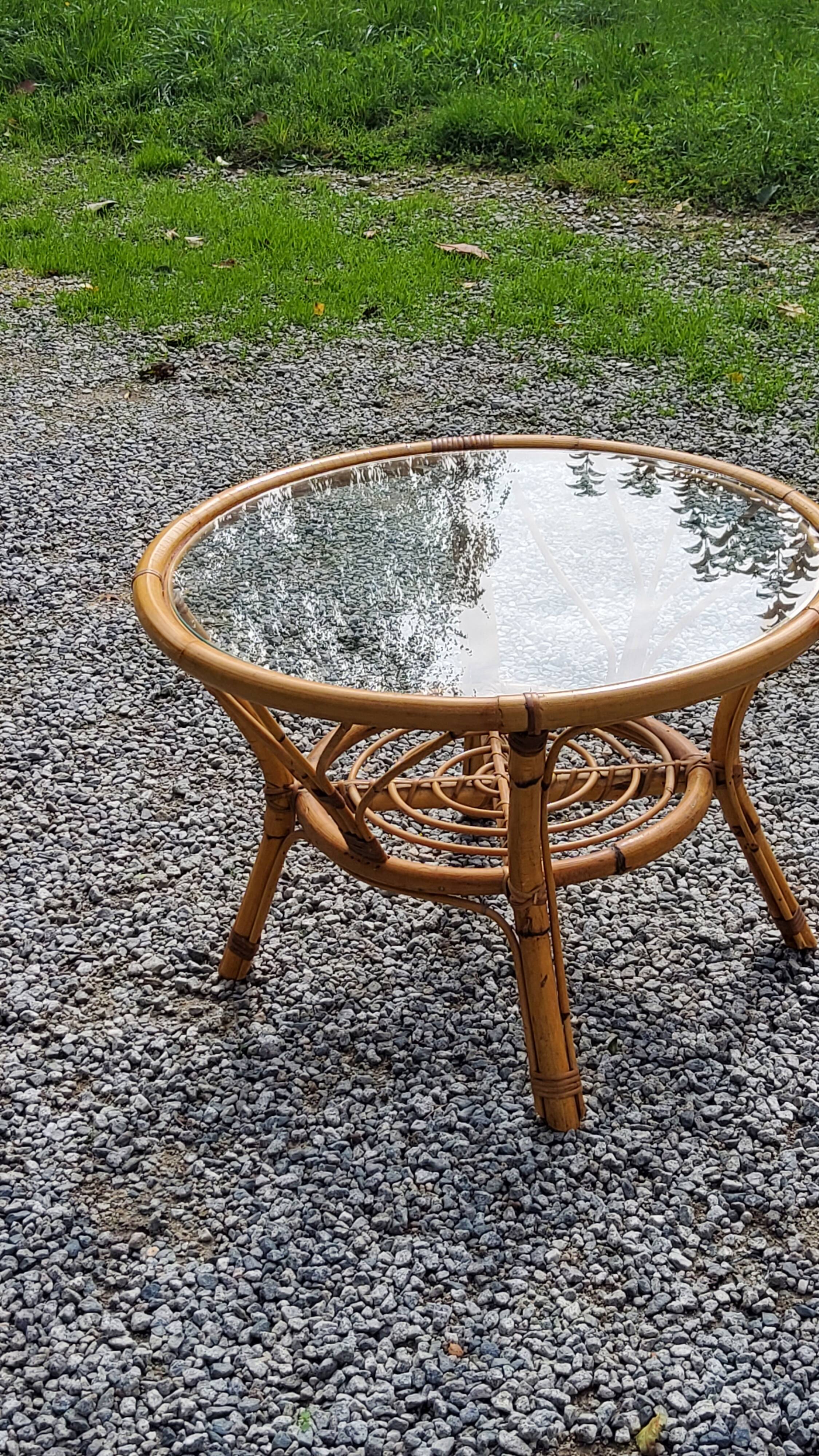 Round rattan coffee table with glass top from the 70s