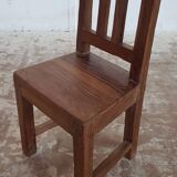 Old children's chair in solid teak