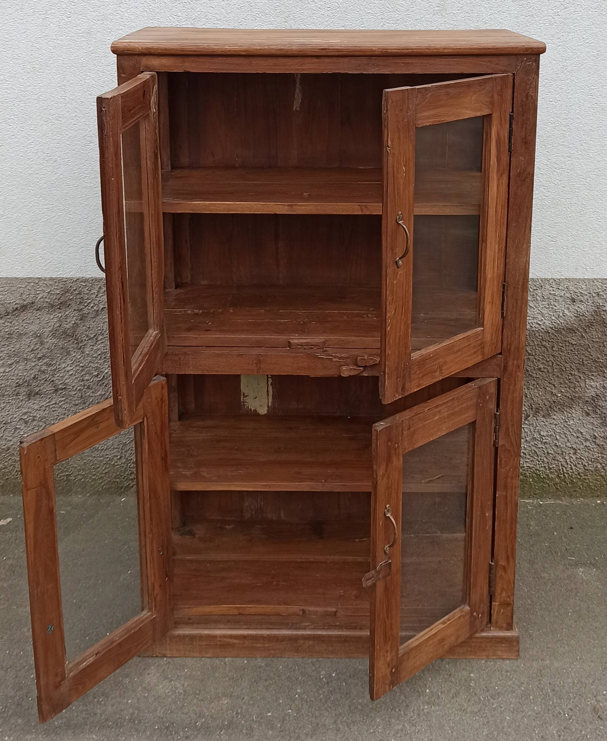 Old wooden display cabinet with three glazed sides