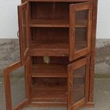 Old wooden display cabinet with three glazed sides