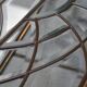 Deux vitraux en verre biseauté et laiton