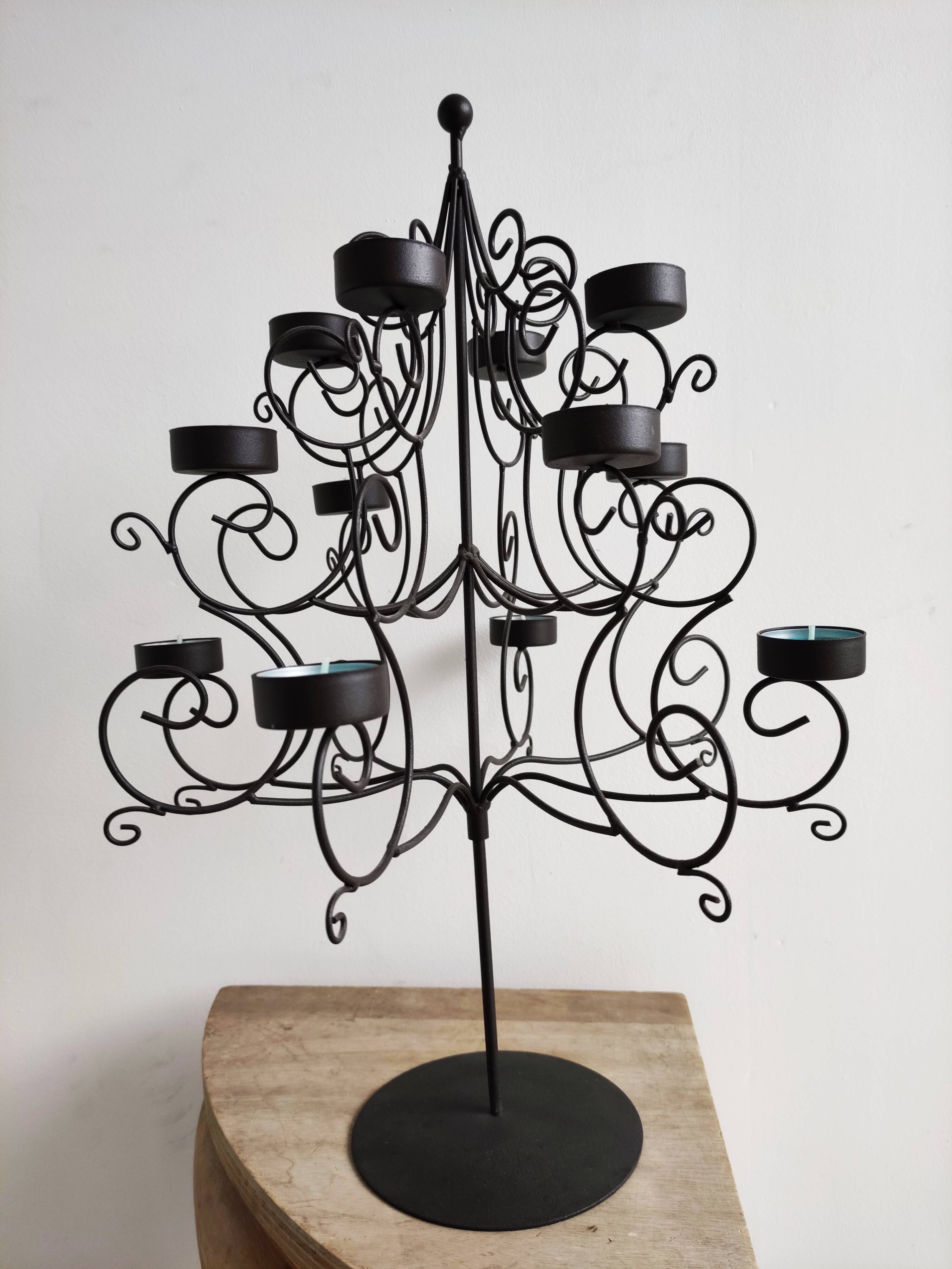 Black metal candlestick for 12 candles