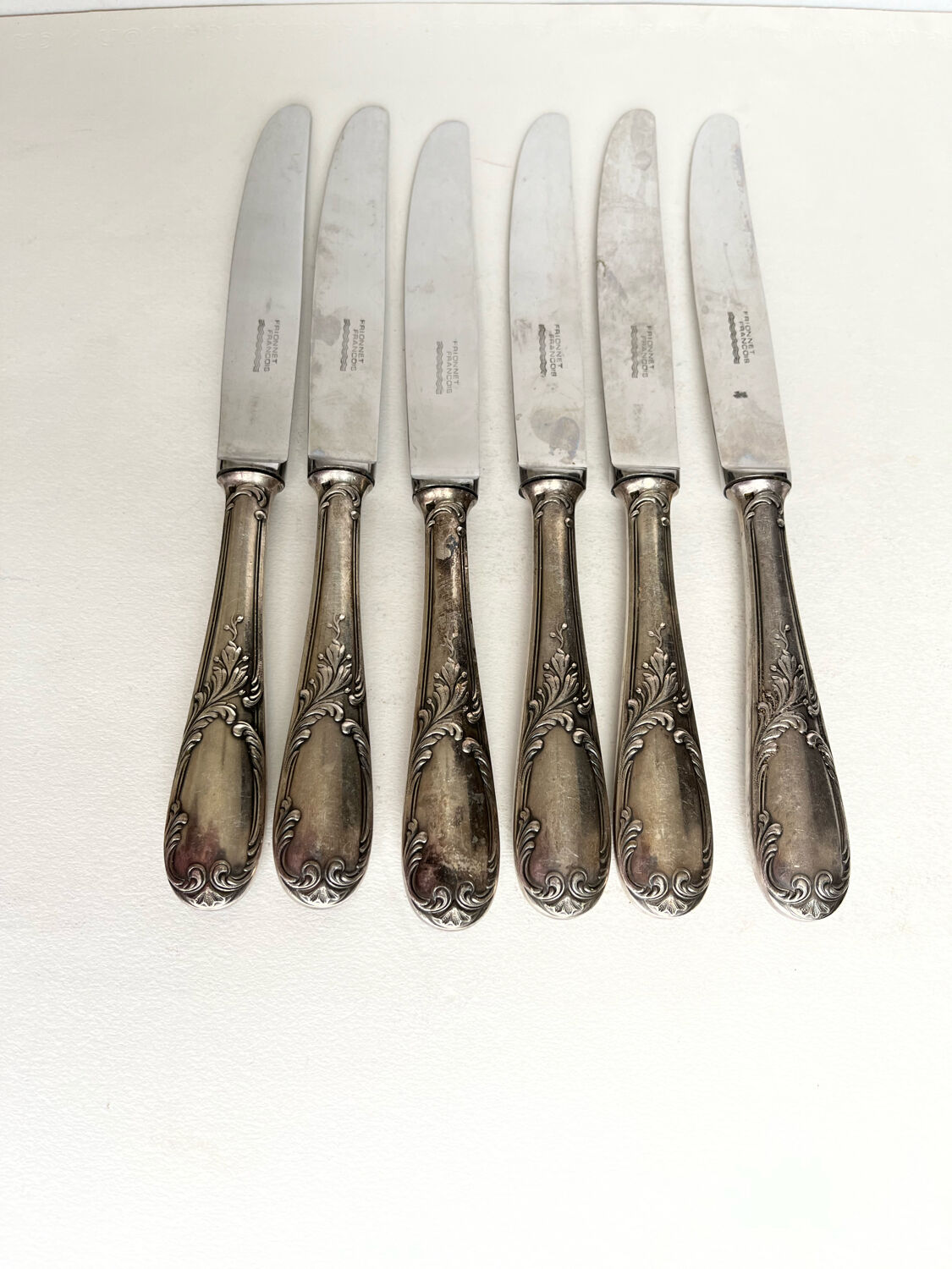 6 silver metal knives