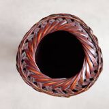 Japanese vase made of woven bamboo. Ikebana