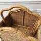 Magazine holder / Pine hutch in rattan, bamboo and canning 70s