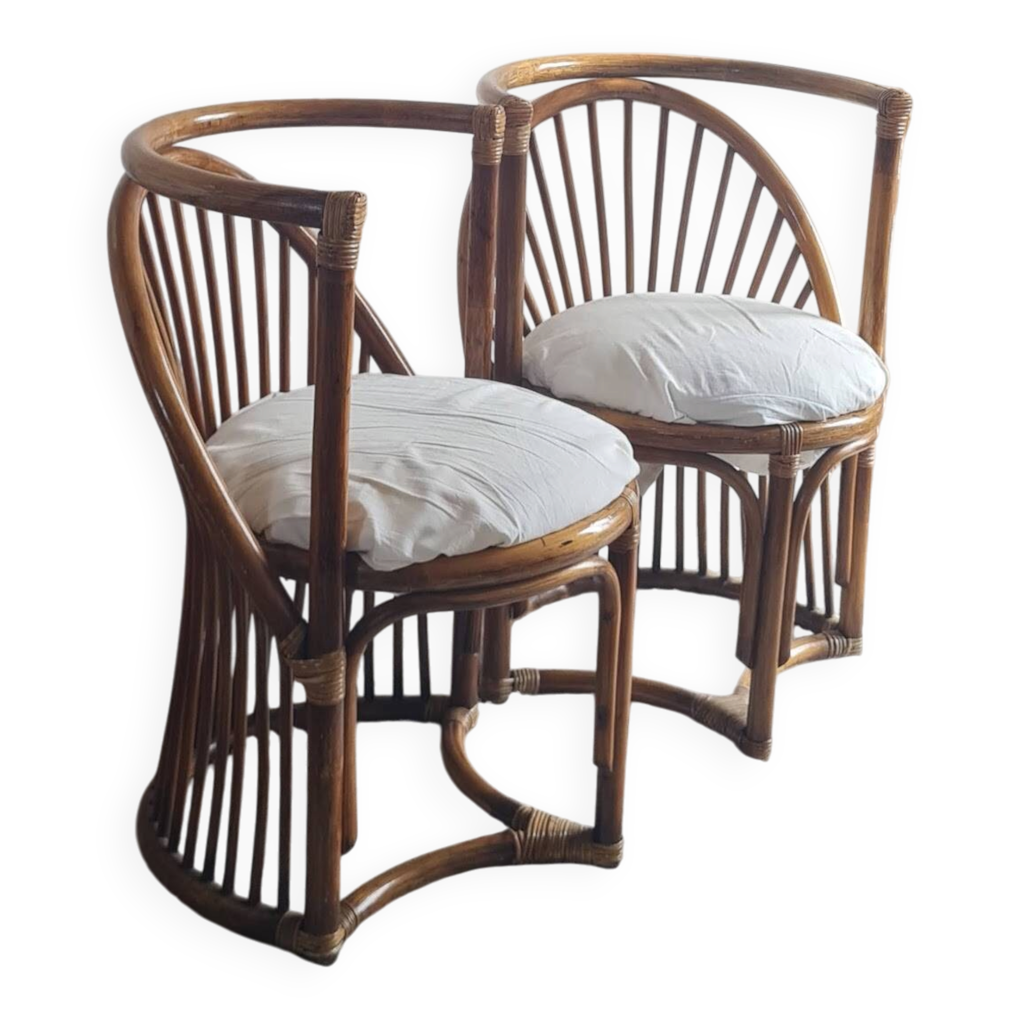 Pair of vintage rattan armchairs circa the 1960s.