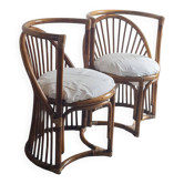 Pair of vintage rattan armchairs circa the 1960s.