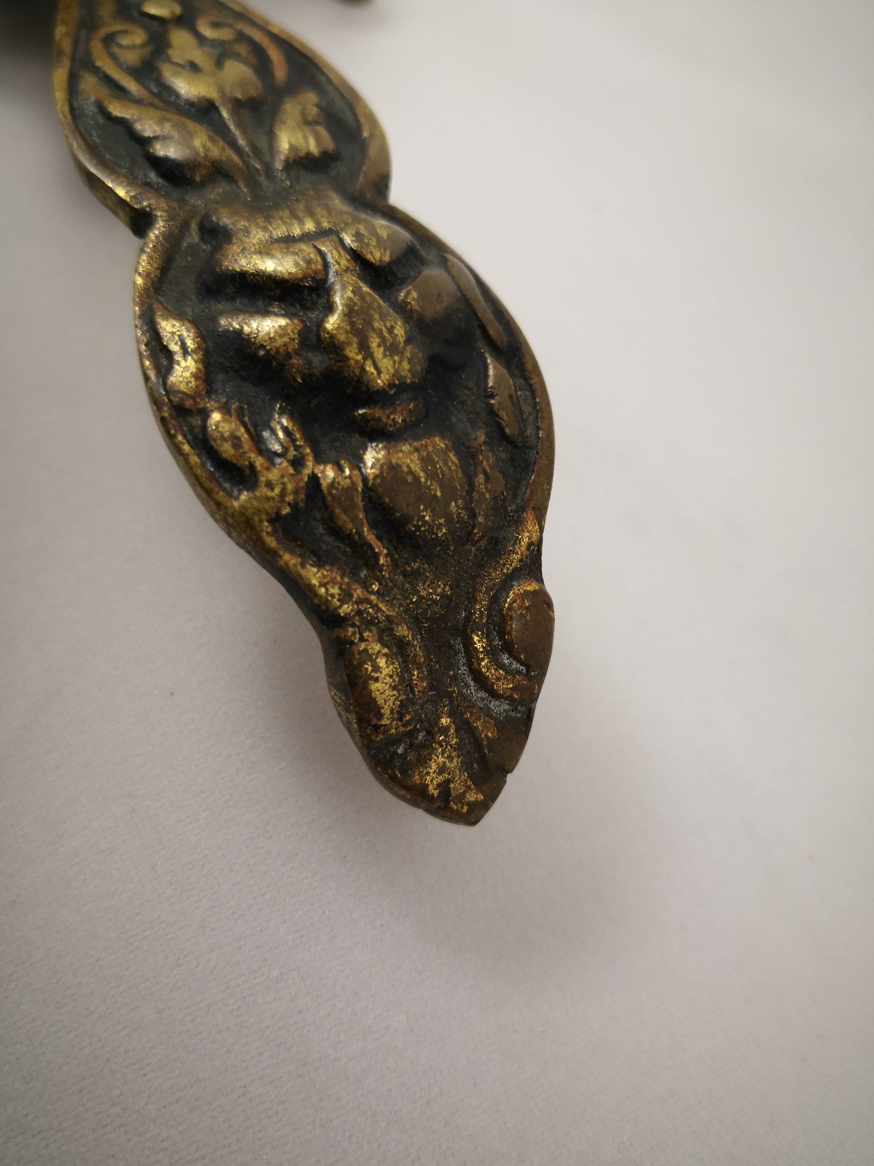 bronze or brass candle holder, cellar level