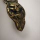 bronze or brass candle holder, cellar level