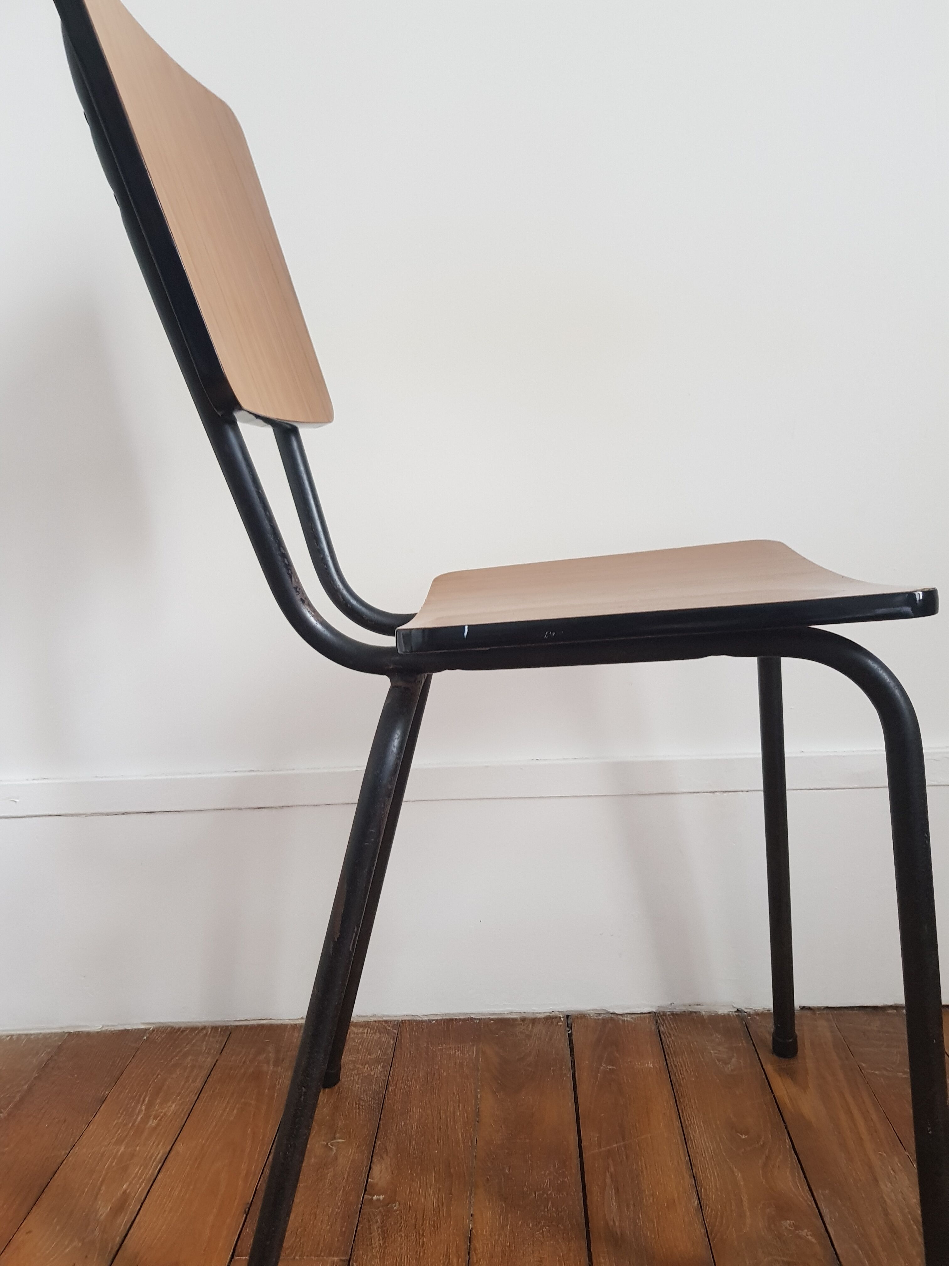 Brown formica chair with black structure